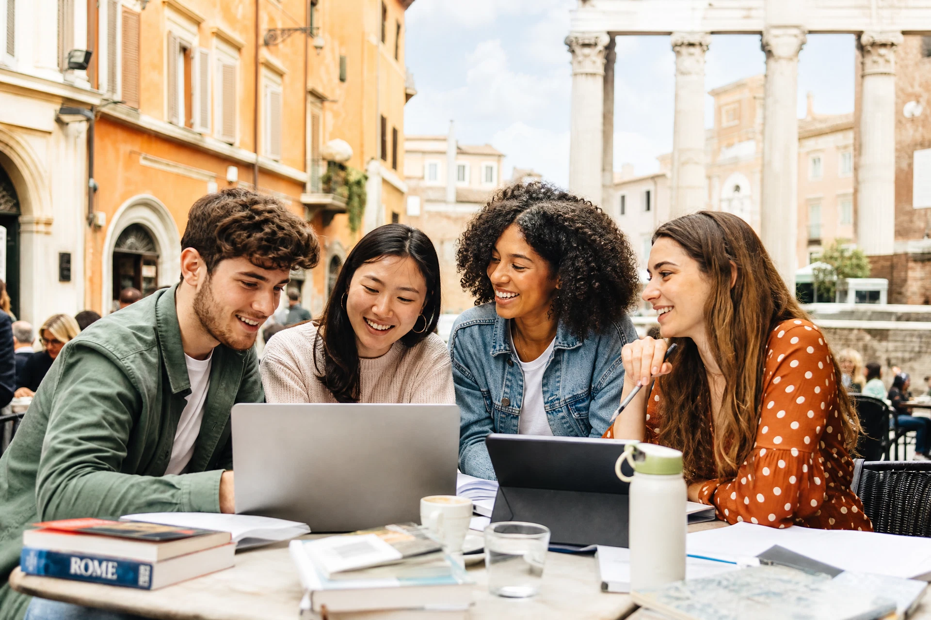 Students working together at a café in Rome